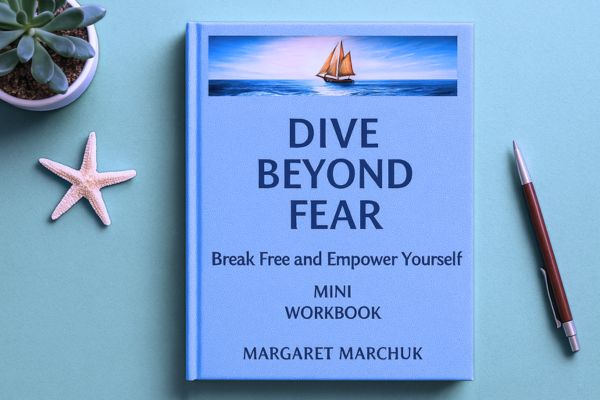 Dive Beyond Fear Mini Workbook by Margaret Marchuk, featuring a sailboat on the ocean cover design with a motivational subtitle Break Free and Empower Yourself